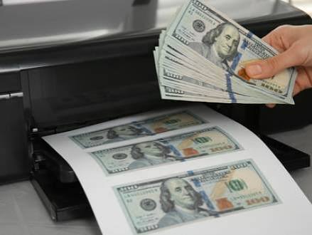 Is It Illegal to Use Counterfeit Money?